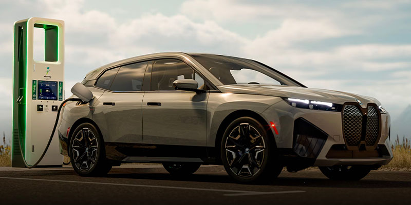 2025 BMW iX at a charging station
