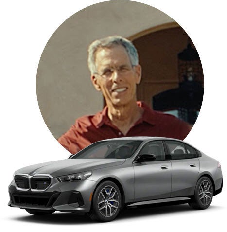 Image of John and his BMW i5.
