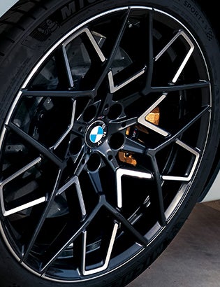 Detail shot of the BMW M forged wheels in bi-color.