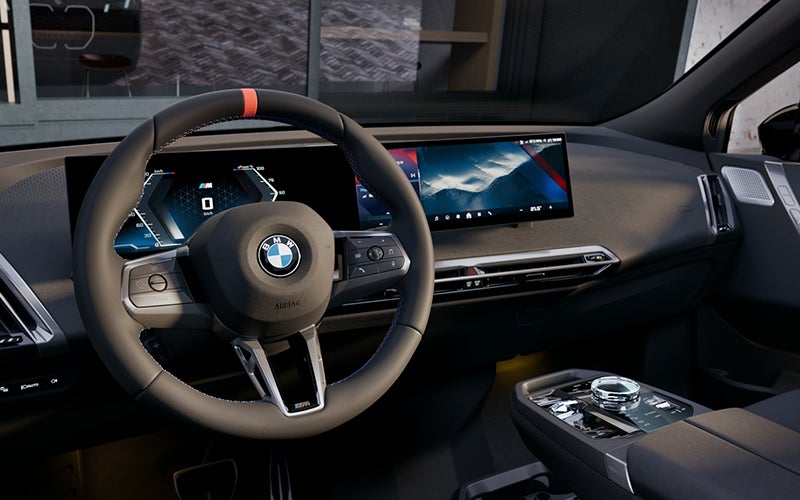Interior steering wheel and dashboard of the BMW iX M70. | Tom Bush BMW Jacksonville in Jacksonville FL